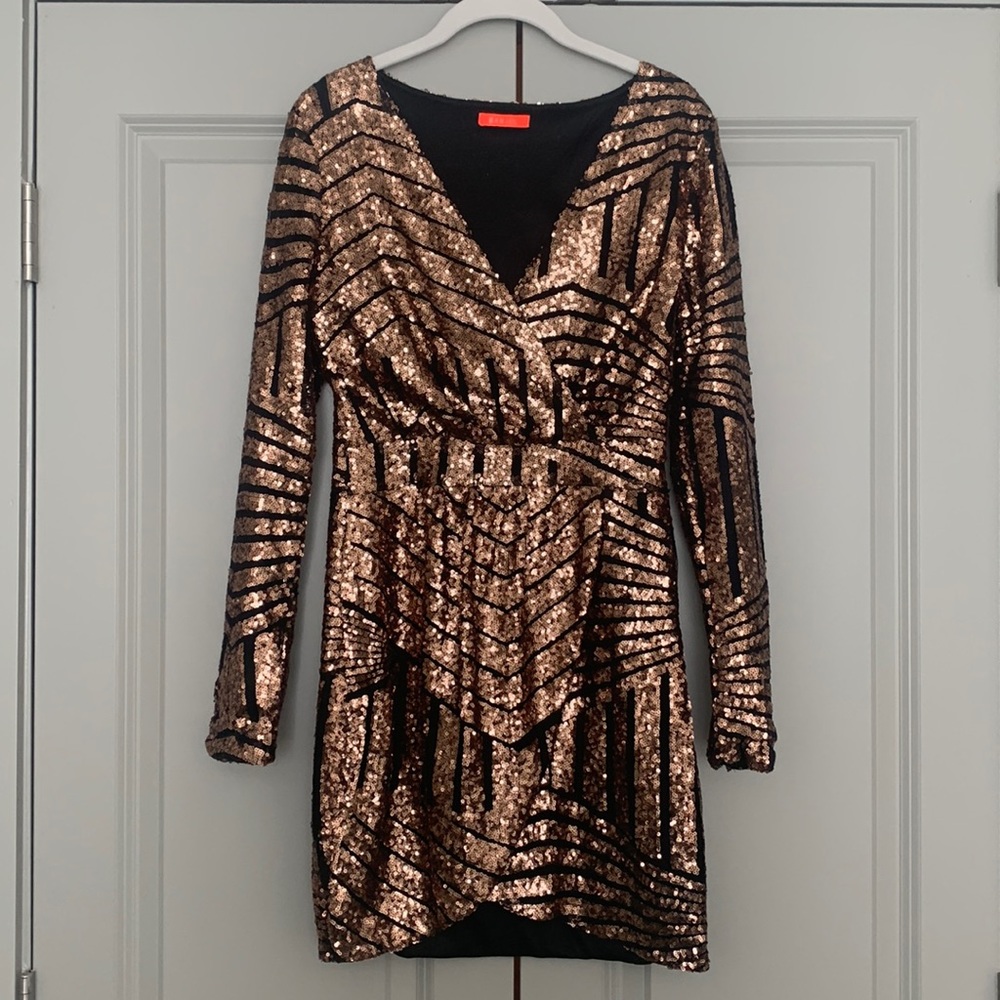 Gold sequin and black lined long sleeved mini dress